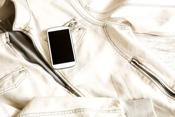 Smartphone and a Jacket — Stock Photo, Image